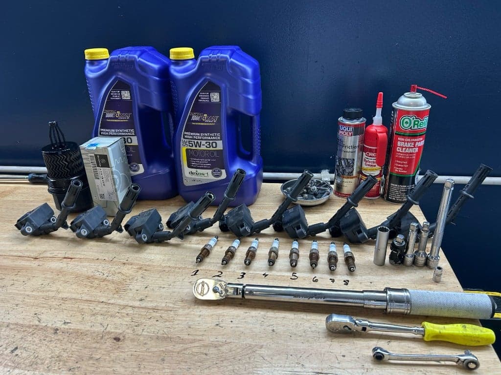 OEM parts and Snap-on tools laid out for a Mercedes-Benz V8 ignition and oil service at Beloit Motor Werks